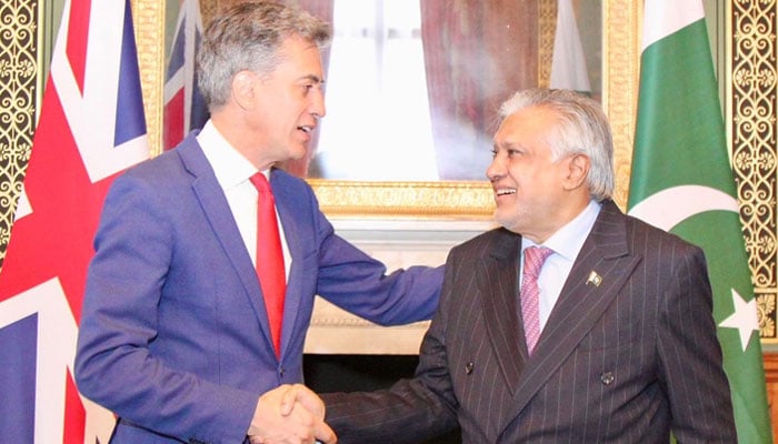 Deputy Prime Minister and Foreign Minister Senator Ishaq Dar shakes hand with British Foreign Secretary Ed Miliband in London on August 27, 2026. — X/ @ForeignOfficePk