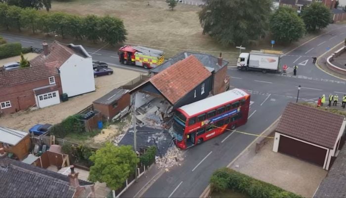 Double-Decker bus crashes into home in UK village: Neighbours detail horror (Pic Credit: ITV News Anglia)