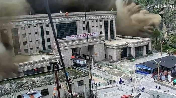 What triggered the catastrophic flood on the Nepal-Tibet border?