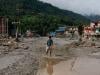 Rescuers search for survivors after devastating Nepal floods leave over 160 dead