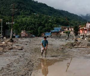 Rescuers search for survivors after devastating Nepal floods leave over 160 dead
