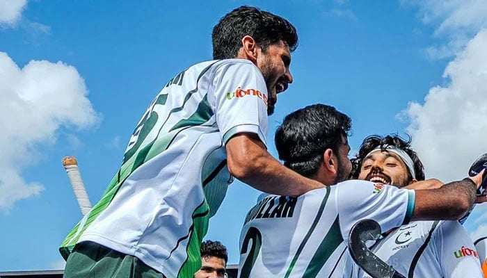 Pakistan players celebrate winning their FIH Hockey World Cup classification match against Japan at the Wagener Stadium in Amstelveen on August 22, 2026. — FIH