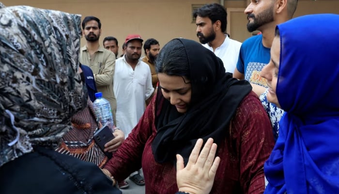 Javeria, mother of a newborn victim, is consoled following a deadly fire at the Pakistan Institute of Medical Sciences (PIMS) hospital in Islamabad, Pakistan, August 26, 2026. — Reuters