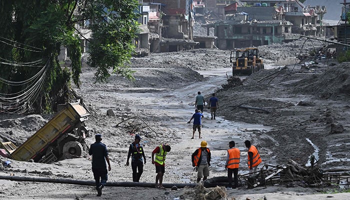 Rescue works continue at Trishuli Center in Nepals Nuwakot district on August 30, 2026, after catastrophic flooding on the Nepal-Tibet border. — AFP