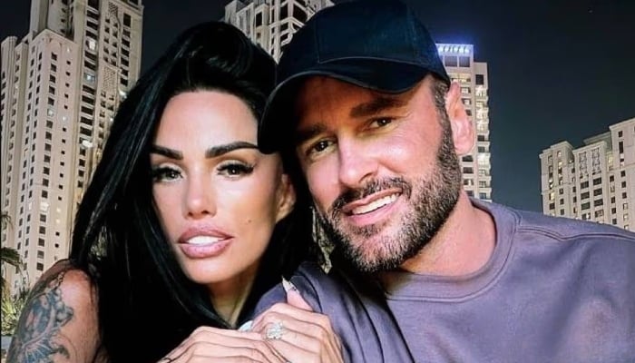 Katie Price displayed the words Owned by Lee, during a recent pool day in Ibiza