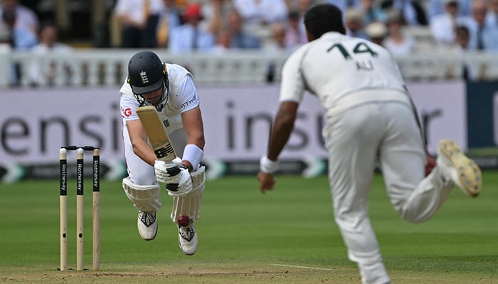 Englands Josh Tongue is knocked off his feet by a ball from Pakistans Mohammad Ali on day four of the second test match between England and Pakistan at Lords cricket ground in London on August 30, 2026. — AFP
