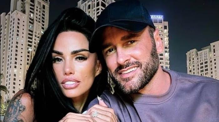 Katie Price puts on loved up display for jailed husband Lee Andrews