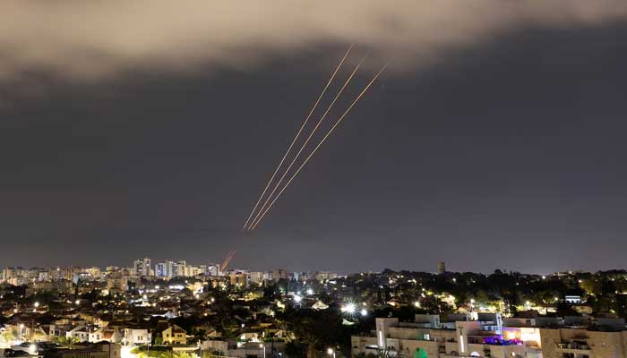 An anti-missile system operates after Iran launched drones and missiles toward Israel, as seen from Ashkelon, Israel, April 14. — Reuters