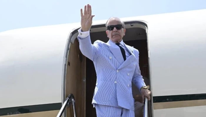 Prime Minister Shehbaz Sharif gestures as he departs on a visit to Turkiye from Lahore, on May 25, 2025. — Facebook@ShehbazSharif