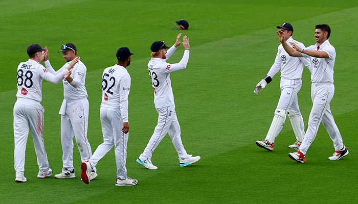 Englands Harry Brook celebrates with teammates after taking a catch to dismiss Pakistans Saud Shakeel during the second Test at Lords in London on August 30, 2026. — Reuters