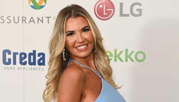 Christine wowed her fans in a skimpy two-piece as she was pictured posing on a daybed
