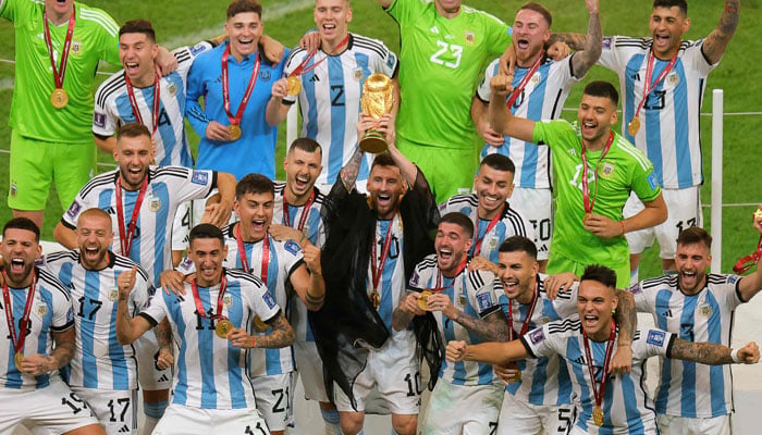 Argentina’s forward Lionel Messi lifts the World Cup trophy during the Qatar 2022 World Cup trophy ceremony after the football final match between Argentina and France at Lusail Stadium in Lusail, north of Doha on December 18, 2022. — AFP