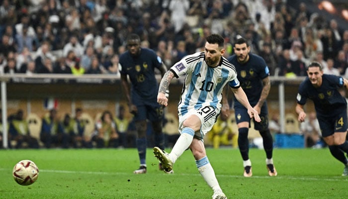 Argentina’s Lionel Messi scores his side’s first goal from the penalty spot during the 2022 FIFA World Cup final against France at Lusail Stadium in Lusail, Qatar, on December 18, 2022. — Reuters