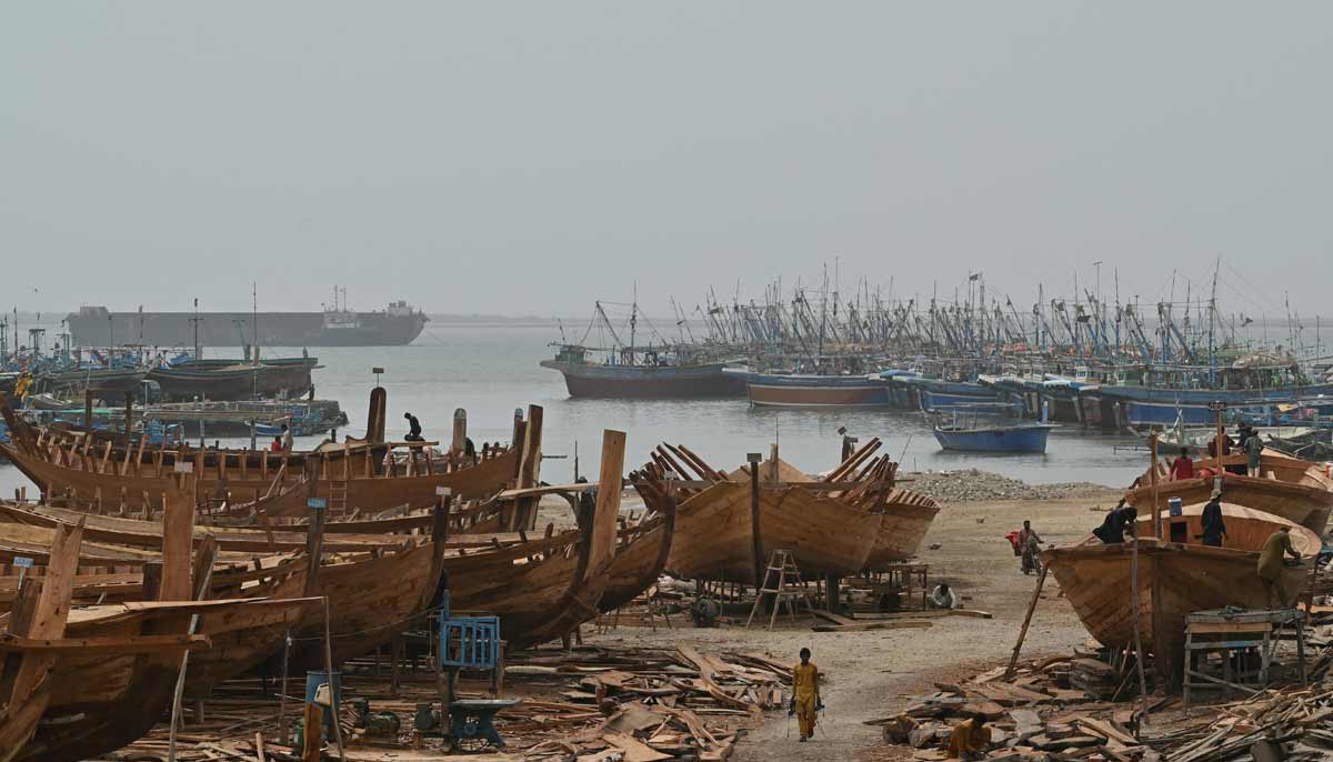 Traditional wooden boats at Ibrahim Hyderi yard in Karachi. — AFP