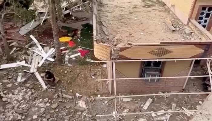 Rubble lies around damaged houses following a reported attack near a wedding gathering in Kuhistik, Sirik, Iran, September 2, 2026. — Reuters