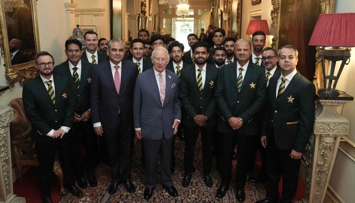 Britains King Charles III poses for a photo with members of the Pakistan National Cricket Team during an audience at Clarence House, central London on September 2, 2026. — AFP
