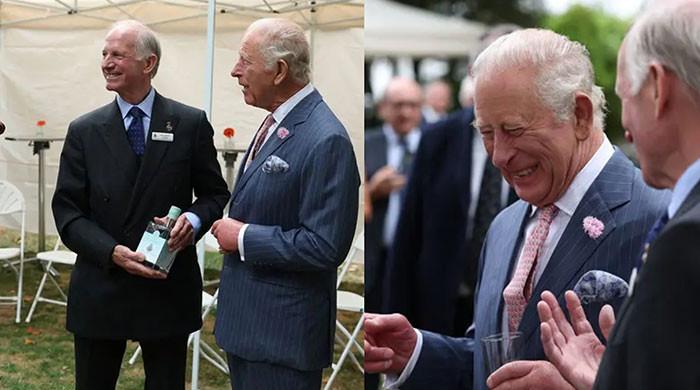 King Charles jokes about ‘stress' before sending a plaque flying