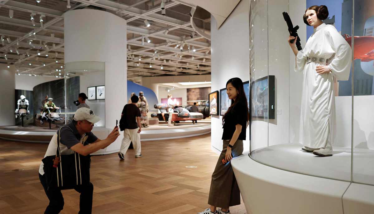 A Princess Leia costume from The Empire Strikes Back is displayed in the Star Wars in Motion exhibit at the new Lucas Museum of Narrative Art