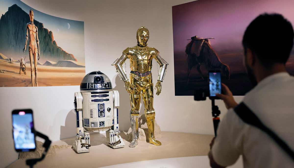 R2-D2 and a C-3PO costumes are displayed in the Star Wars in Motion exhibit at the new Lucas Museum of Narrative Art during a media preview of the 300,000 square foot structure on September 2, 2026 in Los Angeles, California.— AFP
