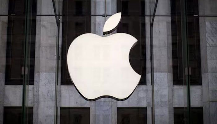 An Apple logo hangs above the entrance to the Apple store on 5th Avenue in the Manhattan borough of New York City, July 21, 2015. — Reuters