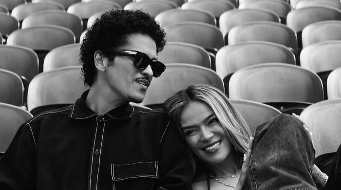 Karol G and Bruno Mars release 'Still' music video