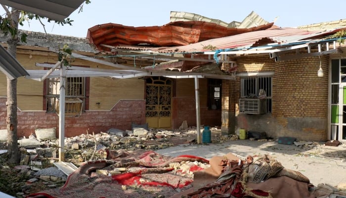Rubble lies around a damaged house following a reported attack near a wedding gathering in Kuhistik, Sirik, Iran, September 2, 2026. — Reuters