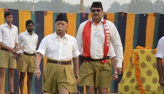 Mohan Bhagwat (third from left), chief of the Hindu nationalist organisation Rashtriya Swayamsevak Sangh (RSS), walks after addressing RSS volunteers during a training camp in Agra, India. — Reuters/File