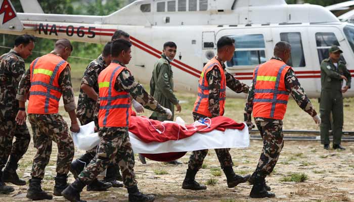 Anil shah, a survivor rescued from a tunnel of the Upper Trishuli 3A hydropower project nine days after the deadly flash floods and a mudslide, is carried to be air lifted to Kathmandu from an army base in Nuwakot, Nepal, September 4, 2026.— Reuters