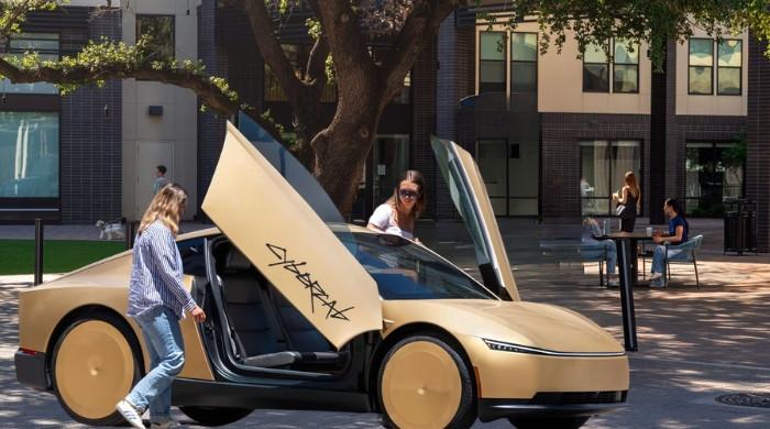 Tesla drums up buzz for driverless Cybercab with 'no steering wheel, no pedals'