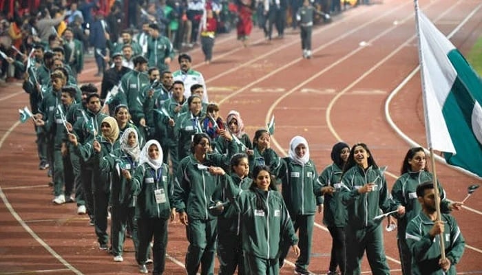 Pakistan contingent marches past at the 13th South Asian Games opening ceremony in Kathmandu on December 10, 2019. — AFP
