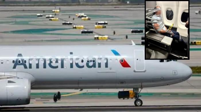 American Airlines passenger duct-taped to seat by fellow flyers after midflight meltdown