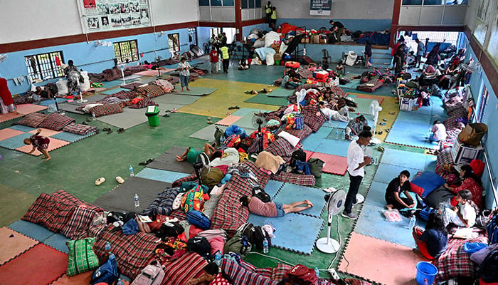 Flash flood survivors rest inside a relief shelter at Devighat in Nepals Nuwakot district on September 6, 2026. — AFP