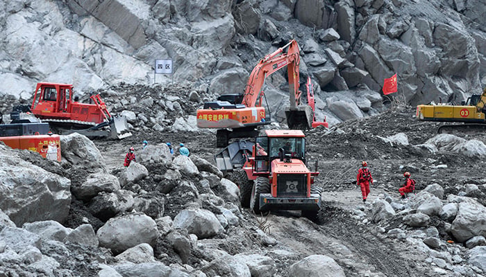 Excavators work during recovery efforts at the site of the destroyed Gyirong Port border crossing in Gyirong County, in China’s western Tibet region on September 5, 2026. — AFP