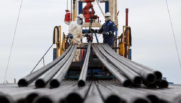 Specialists work at a drilling rig at the Airankol oil field operated by Caspiy Neft in the Atyrau region, Kazakhstan, April 19, 2026. — Reuters