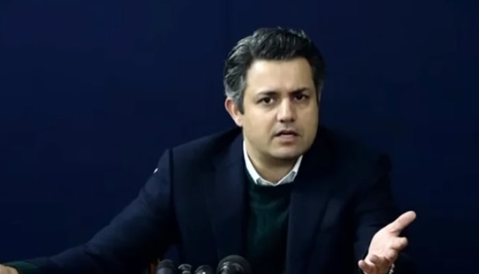 PTI leader Hammad Azhar addresses a press conference in this undated photo. — Screengrab via YouTube/PTI