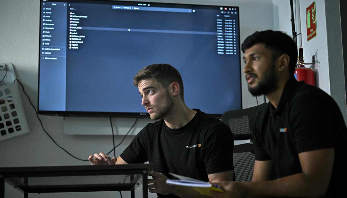 co-founder of the Dognosis Itamar Bitan (L) and his team member observing a test procedure at their facility in Kempohalli village on the outskirts of Bengaluru. A growing body of global research suggests dogs can be trained to detect cancer and other human illnesses, from Parkinsons to Covid-19.— AFP