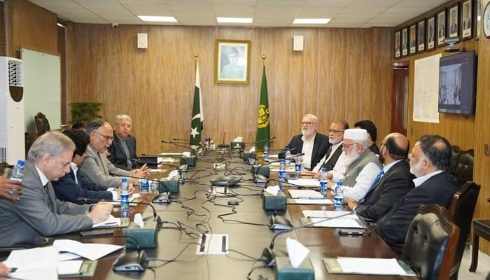 Minister for Planning, Development and Speical Initiative Ahsan Iqbal along with other government representatives hold talks with Jamat-e-Islami delegation in Islamabad, September 7, 2026. — X/@JIPOfficial
