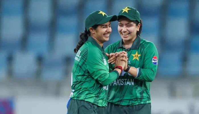 Pakistans Nashra Sandhu (left) celebrates taking a wicket with captain Fatima Sana during their ACC Womens T20 Asia Cup match against Hong Kong, China, at the Dubai International Cricket Stadium in Dubai on September 7, 2026. — ACC