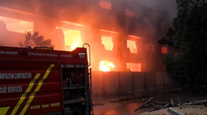 Massive blaze continues to rage at Karachi's Landhi factory, section collapses