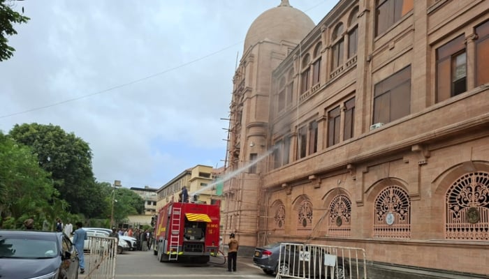 Firefighters work to extinguish a fire at KMC head office in Karachi, September 8, 2026. — Geo News