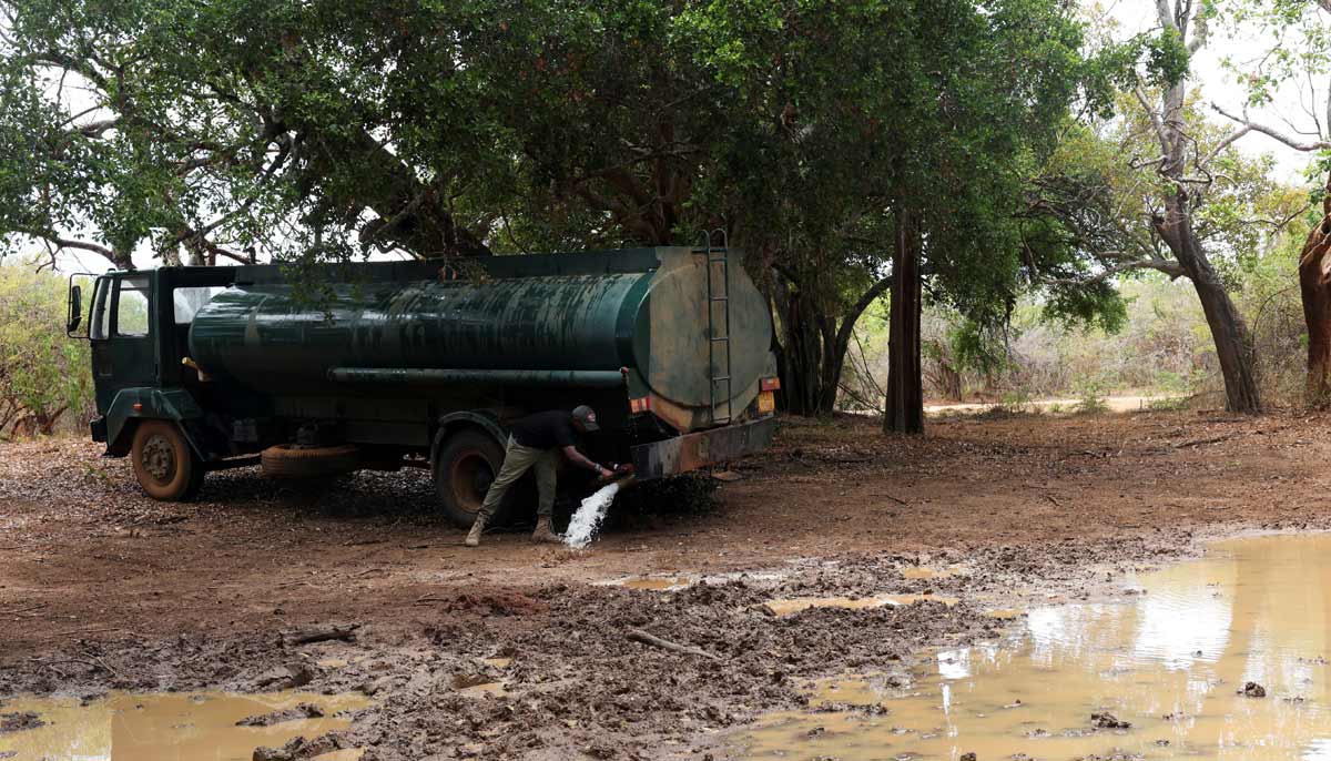 A worker opens a tap on a water tanker to supply water to a pond inside Yala National Park, in southern Sri Lanka, August 25, 2026.— Reuter