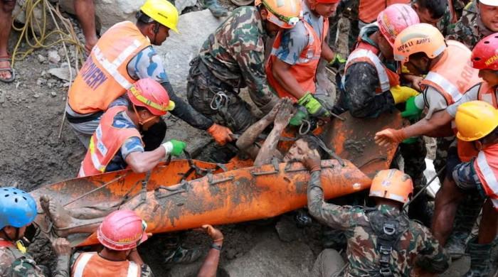 How two men survived nine days trapped inside a Nepal flood tunnel