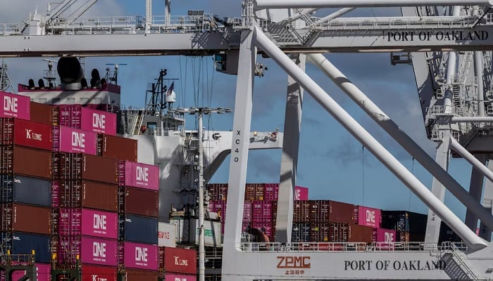 A cargo ship full of shipping containers is seen at the port of Oakland as trade tensions escalate over US tariffs, in Oakland, California, US, March 6, 2025. — Reuters