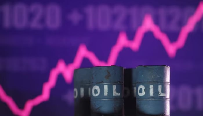 A rising stock graph and 3D printed oil barrels miniature are seen in this illustration taken June 23, 2025. — Reuters