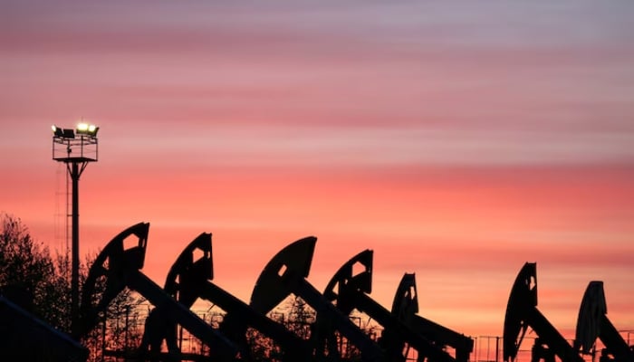 Sunset clouds glow over pump jacks at the Airankol oil field operated by Caspiy Neft in the Atyrau region, Kazakhstan, April 21, 2026. — Reuters