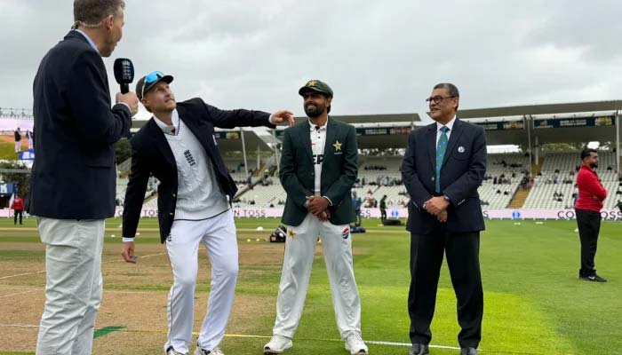 Englands Joe Root (second from left) and Pakistan captain Babar Azam (centre) look on during the toss ahead of the third Test match at Edgbaston, Birmingham, on September 9, 2026. — PCB