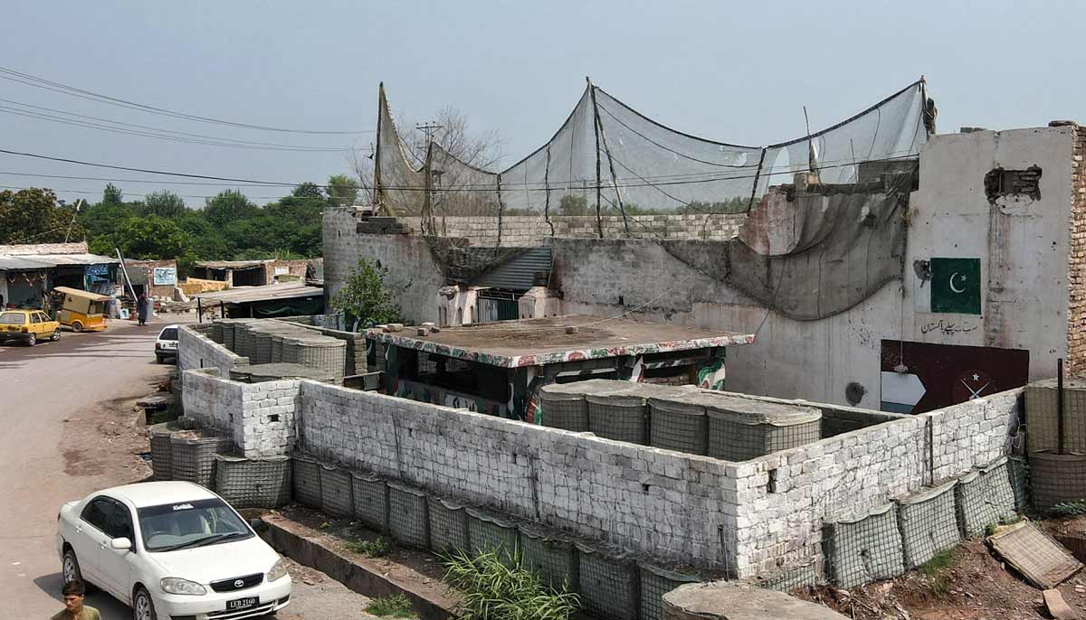 A police post fortified with mesh barriers and a newly built boundary wall, as a new line of defence against militant drone and aerial attacks at Bara in Khyber Pakhtunkhwa. — AFP