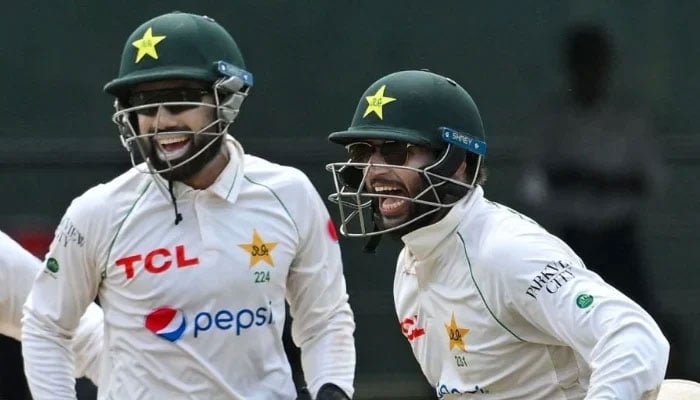 Pakistans Mohammad Rizwan (left) and Imam-ul-Haq celebrate after the dismissal of Dinesh Chandimal on day four of the second Test match against Sri Lanka at the Sinhalese Sports Club (SSC) Ground in Colombo on July 27, 2023. — AFP