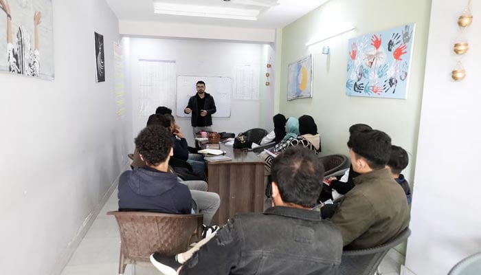 Afghan citizens attend English class near Islamabad, Pakistan, January 22, 2025. — Reuters