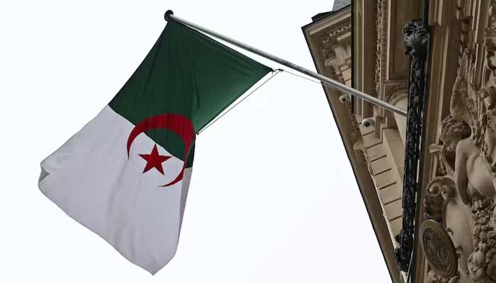 The Algerian flag flies on the facade of the Algerian Embassy in Paris, France, April 16, 2025.— Reuters